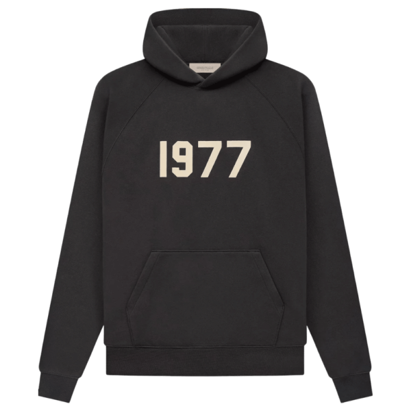 Fear of God 1977 Essentials Hoodie 'Off-Black' featuring a front pocket and large beige numbers 1977 on the chest.