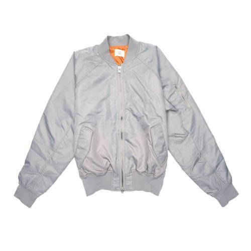 The Fear of God FOG Raglan Bomber Jacket, styled in gray, showcases a front zipper, along with ribbed cuffs and waistband. It includes angled front pockets and a striking orange lining. A zippered pocket detail is featured on one sleeve. The jacket is displayed flat against a white background.